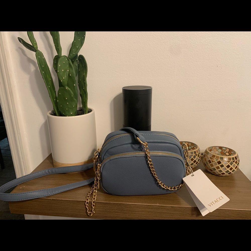 Vitacci Blue crossbody purse.